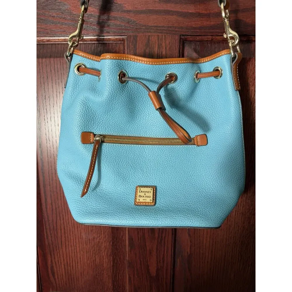 Dooney & Bourke Pebble Grain Drawstring Bucket Bag Blue Leather Red Interior
